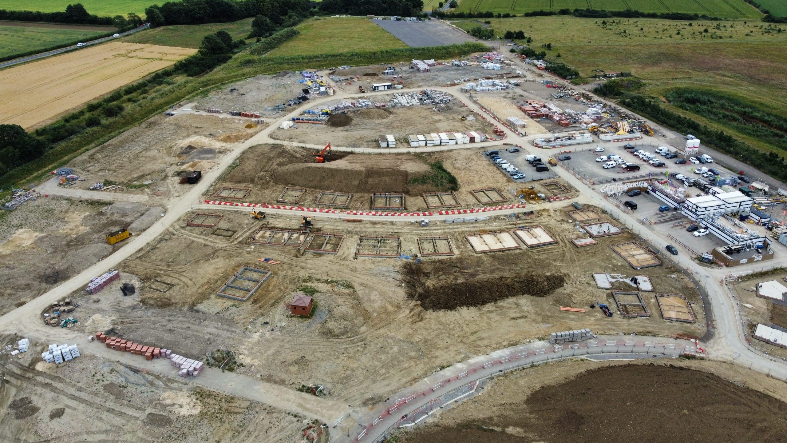 Aerial image of land development in process.